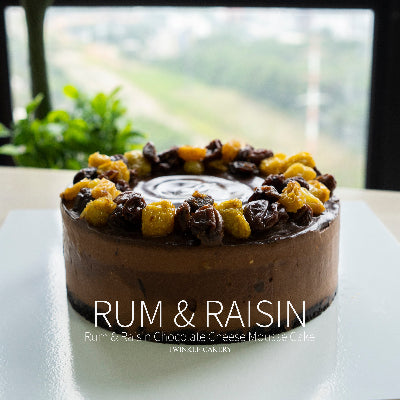 Custom birthday rum raisin cake with decorations in Selangor