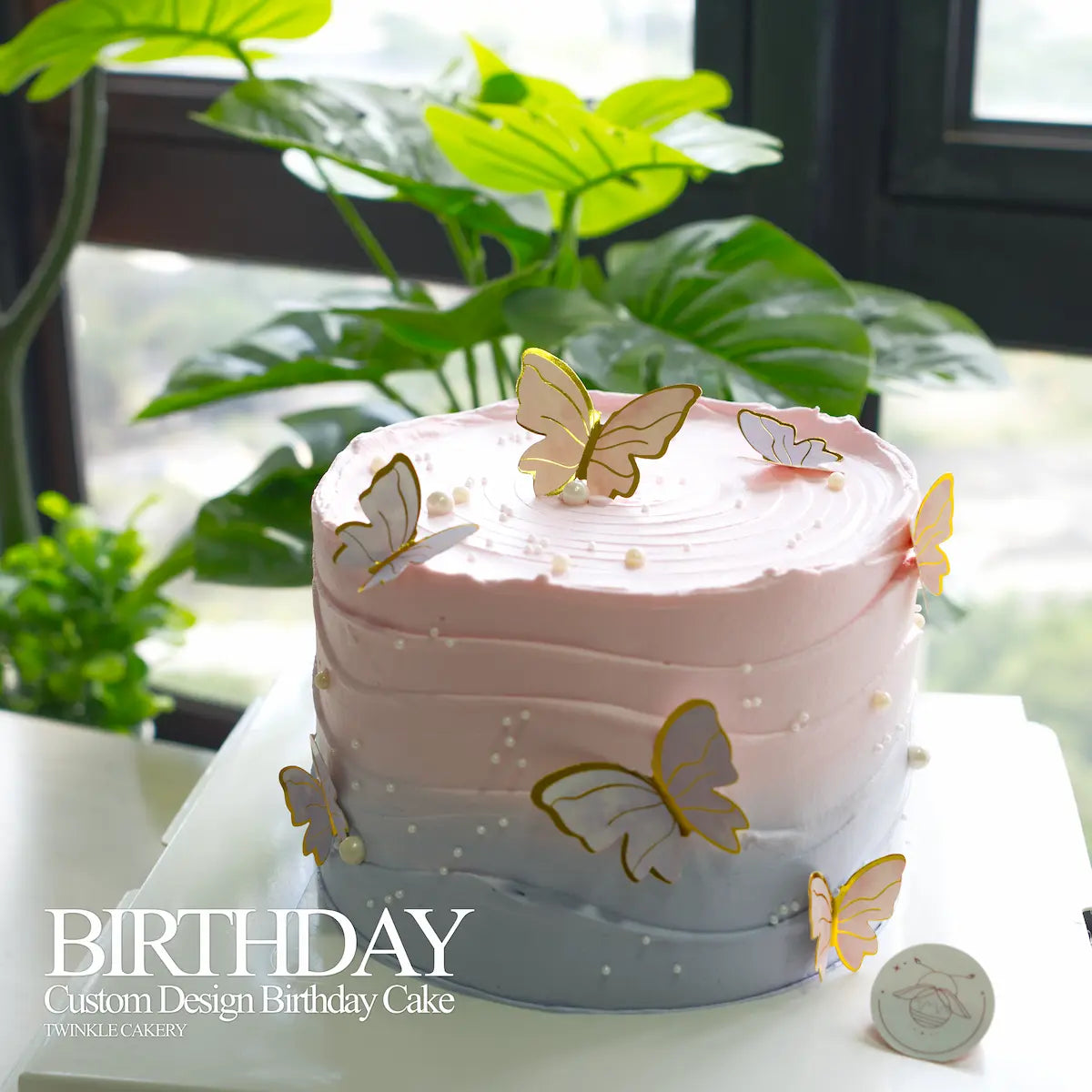 Minimalist butterfly celebration cake displayed in elegant party setting for special occasions
