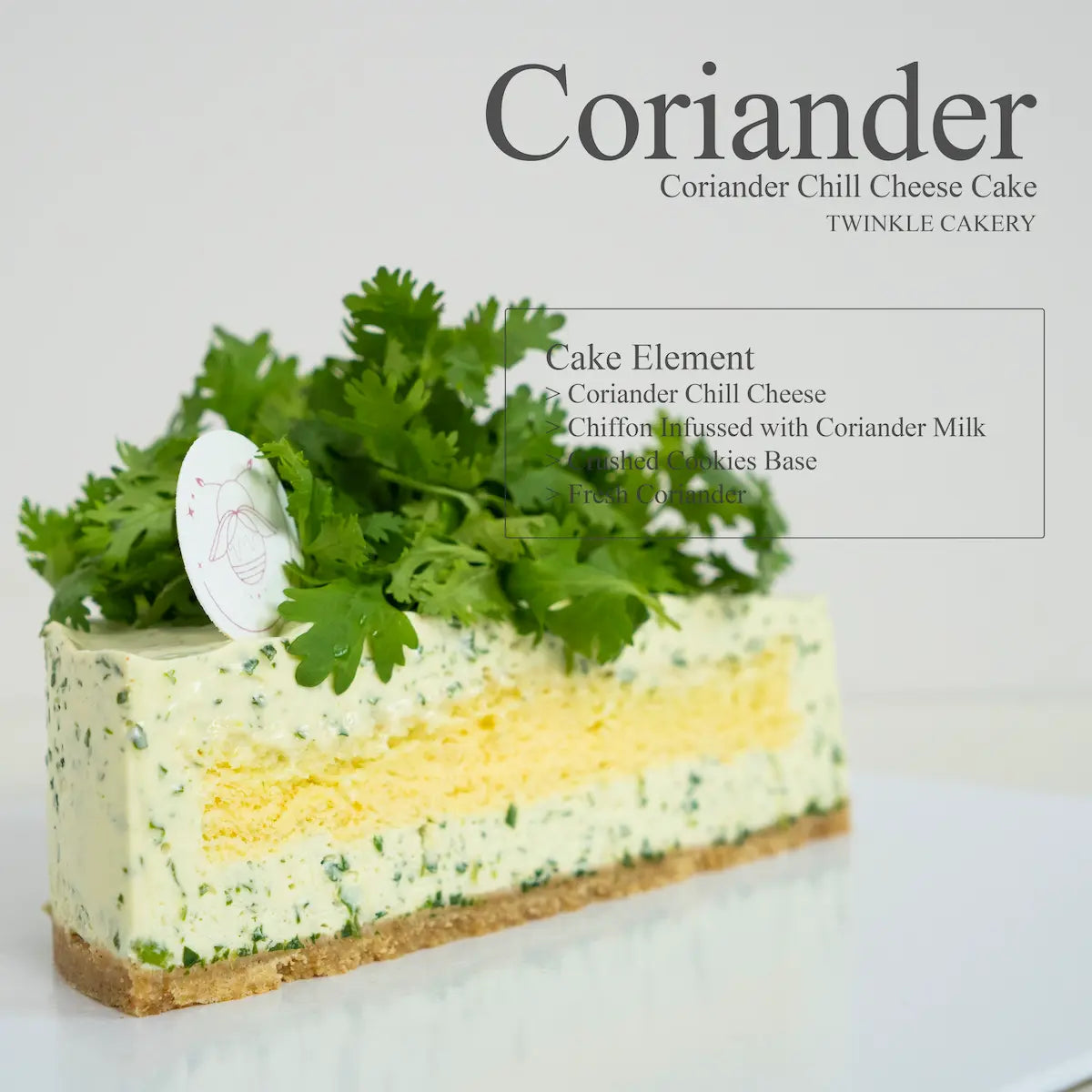 Cross section slice of a chilled coriander cheesecake showing layers of cream cheese and ladyfinger biscuits.