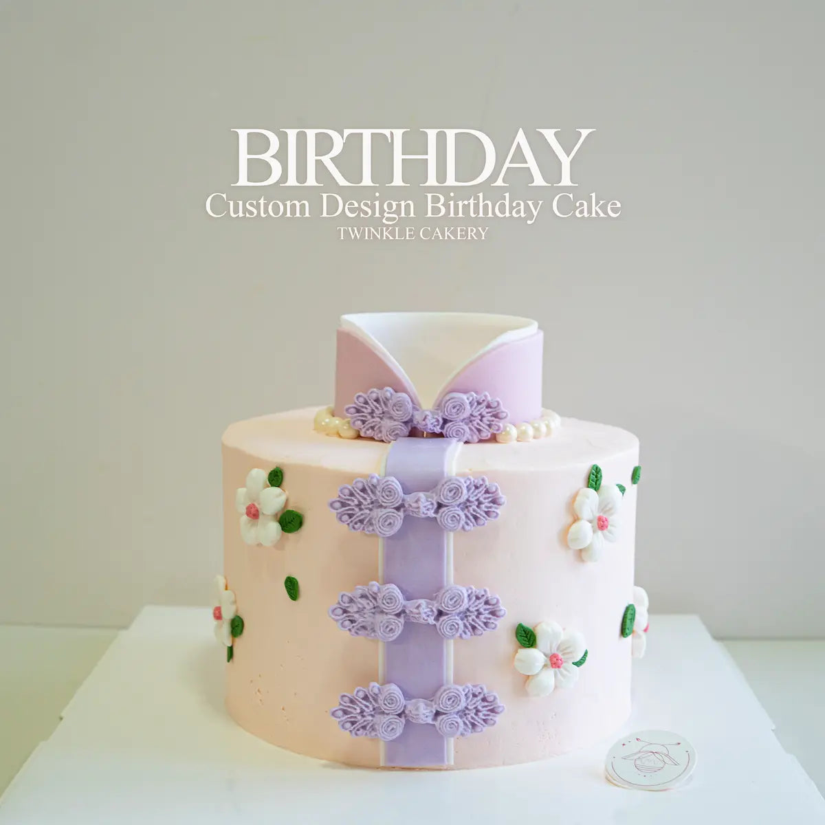 Close-up of intricate Cheong Sam dress details like mandarin collar and knotted buttons on cake - delivery across kuala lumpur