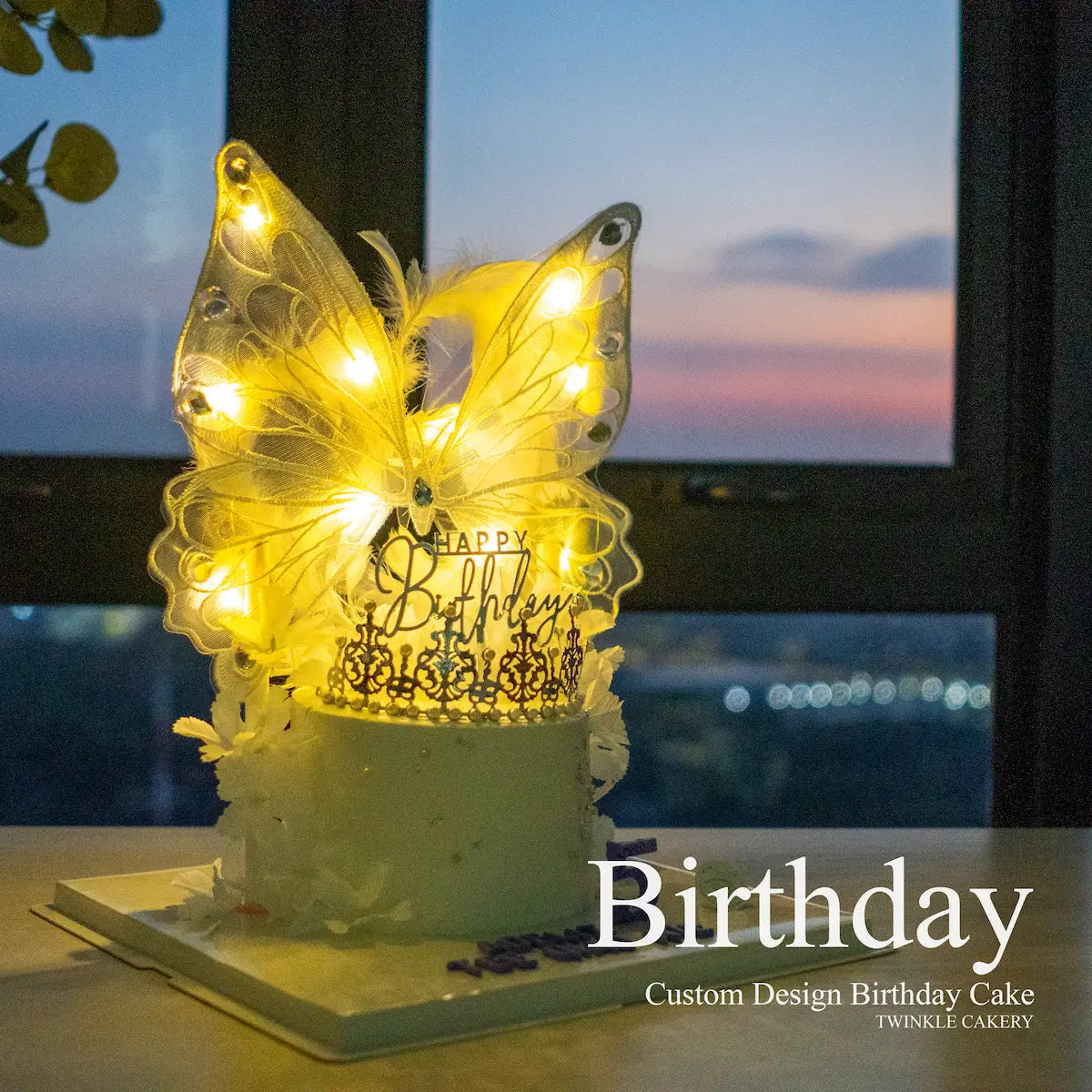 LED butterfly cake in romantic dinner setting with soft lighting. Delivery Selangor