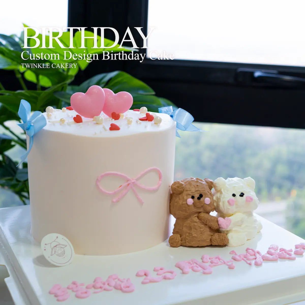 Birthday cake with teddy bears and pink hearts on a table - delivery across Kuala Lumpur
