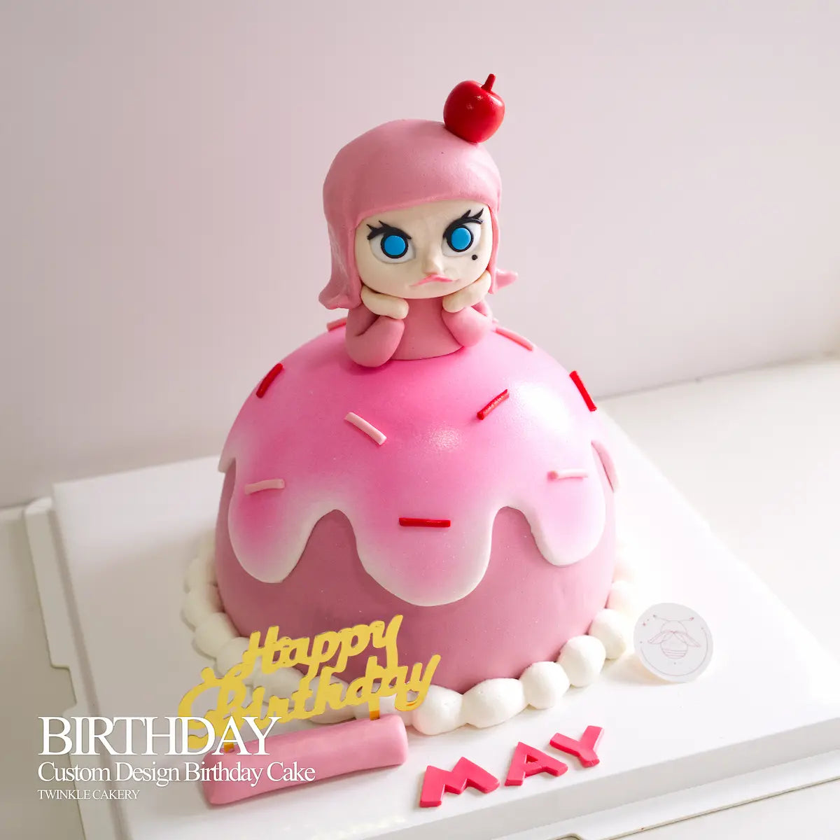 Affordable luxury Molly theme cake with market-competitive pricing and high-quality keepsake toy topper.