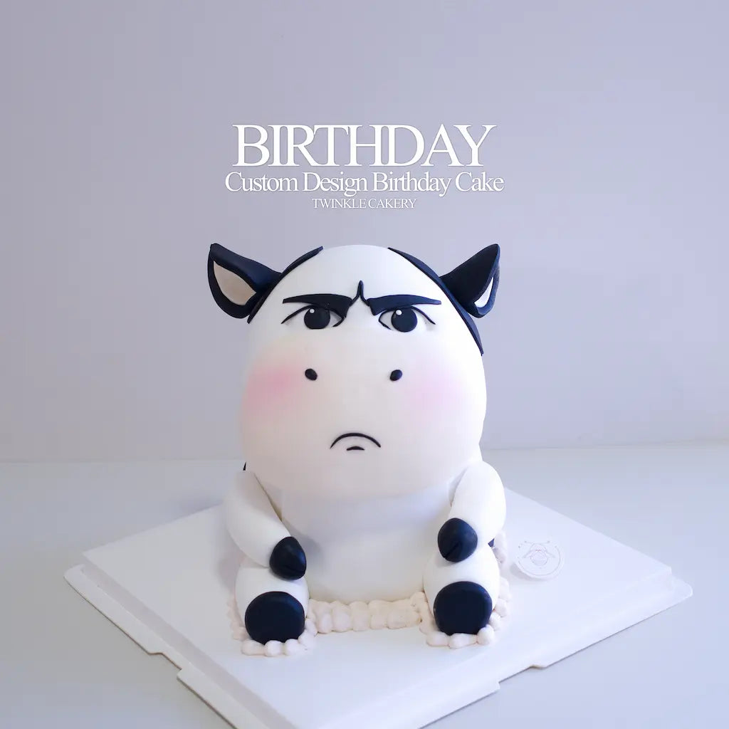 Close-up of angry cute cartoon cow face handcrafted from premium edible fondant by Twinkle Cakery in KL and Selangor