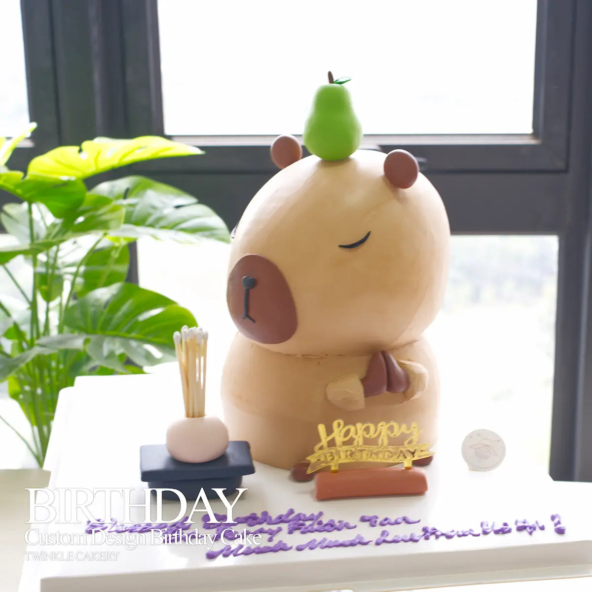 Wide landscape view of a finished custom 3D capybara cake ready for transport as a party centerpiece within the Klang Valley.