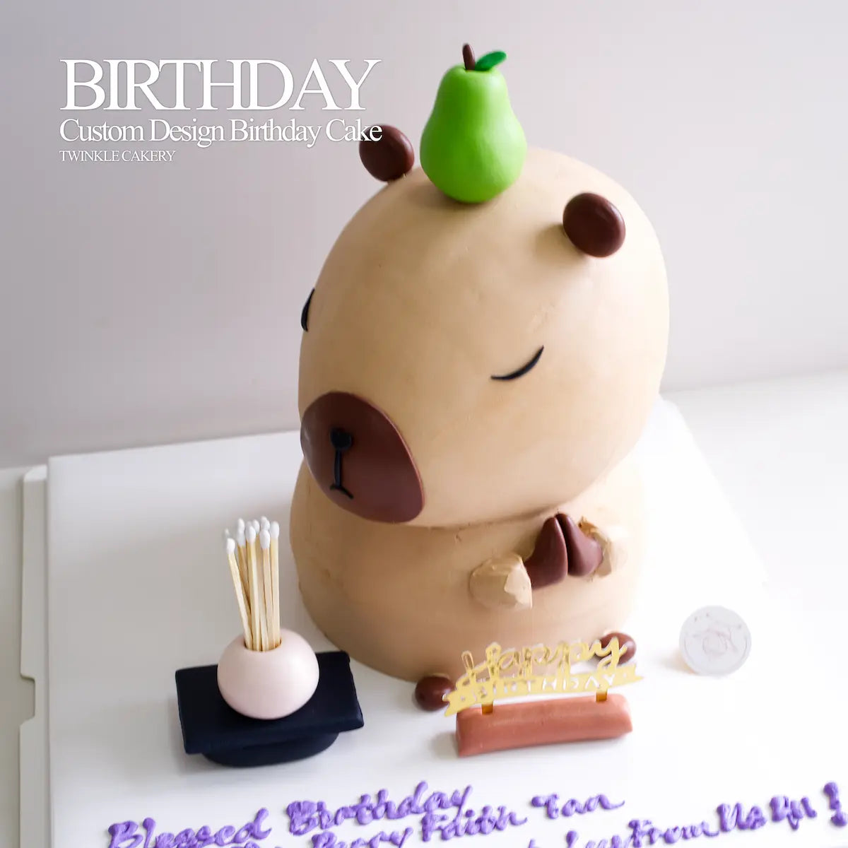Detailed 3D capybara cake with a green pear on its head representing a steady and calming nature. Delivery across Selangor