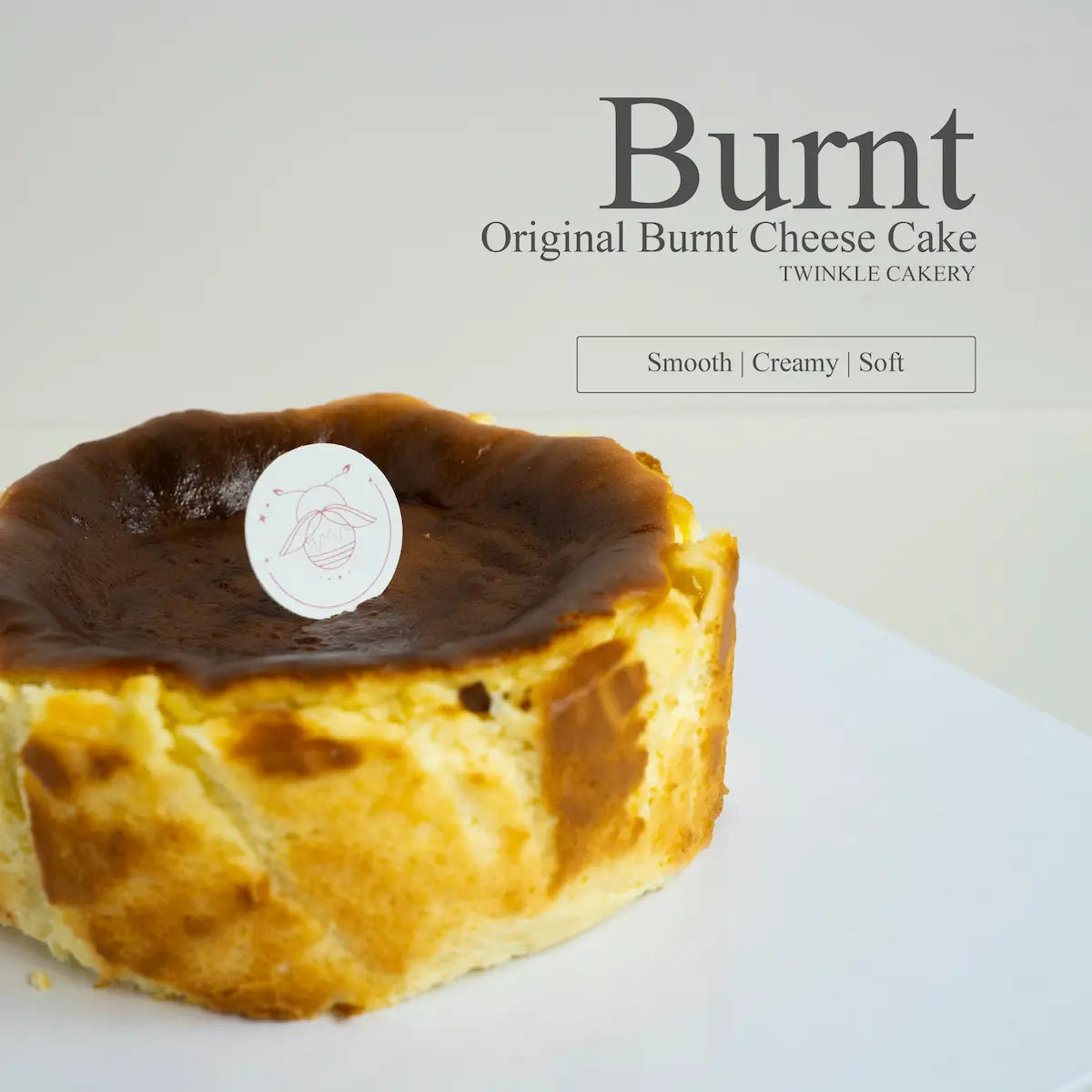 Detailed texture close up of the rustic scorched top on a fondant free baked Basque cheesecake.