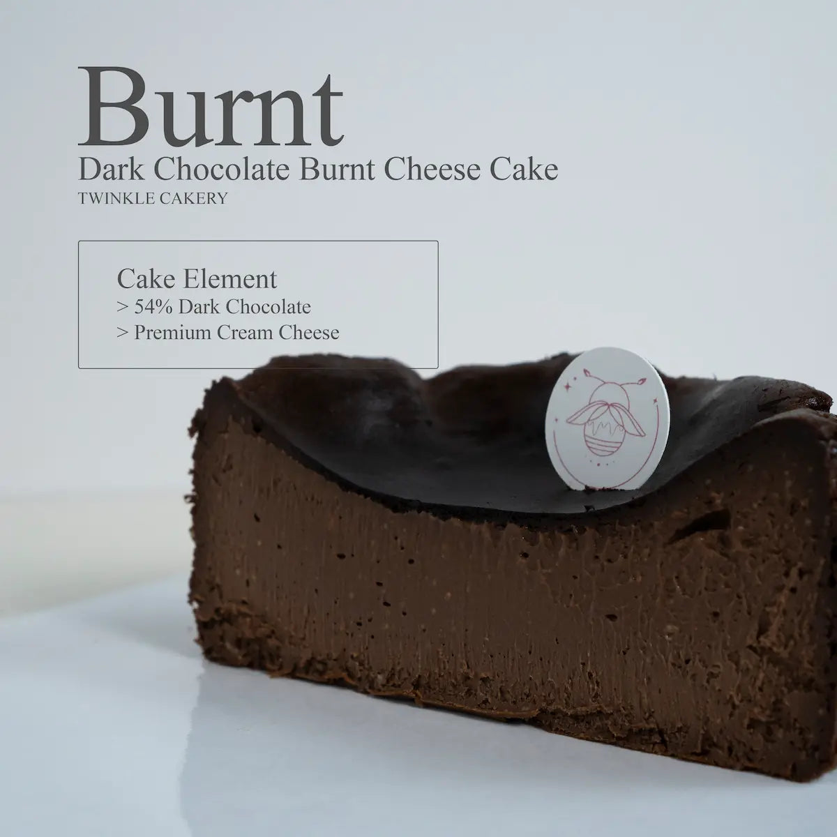 Cross section slice showing the velvety smooth baked cream cheese interior of a chocolate burnt cheesecake.