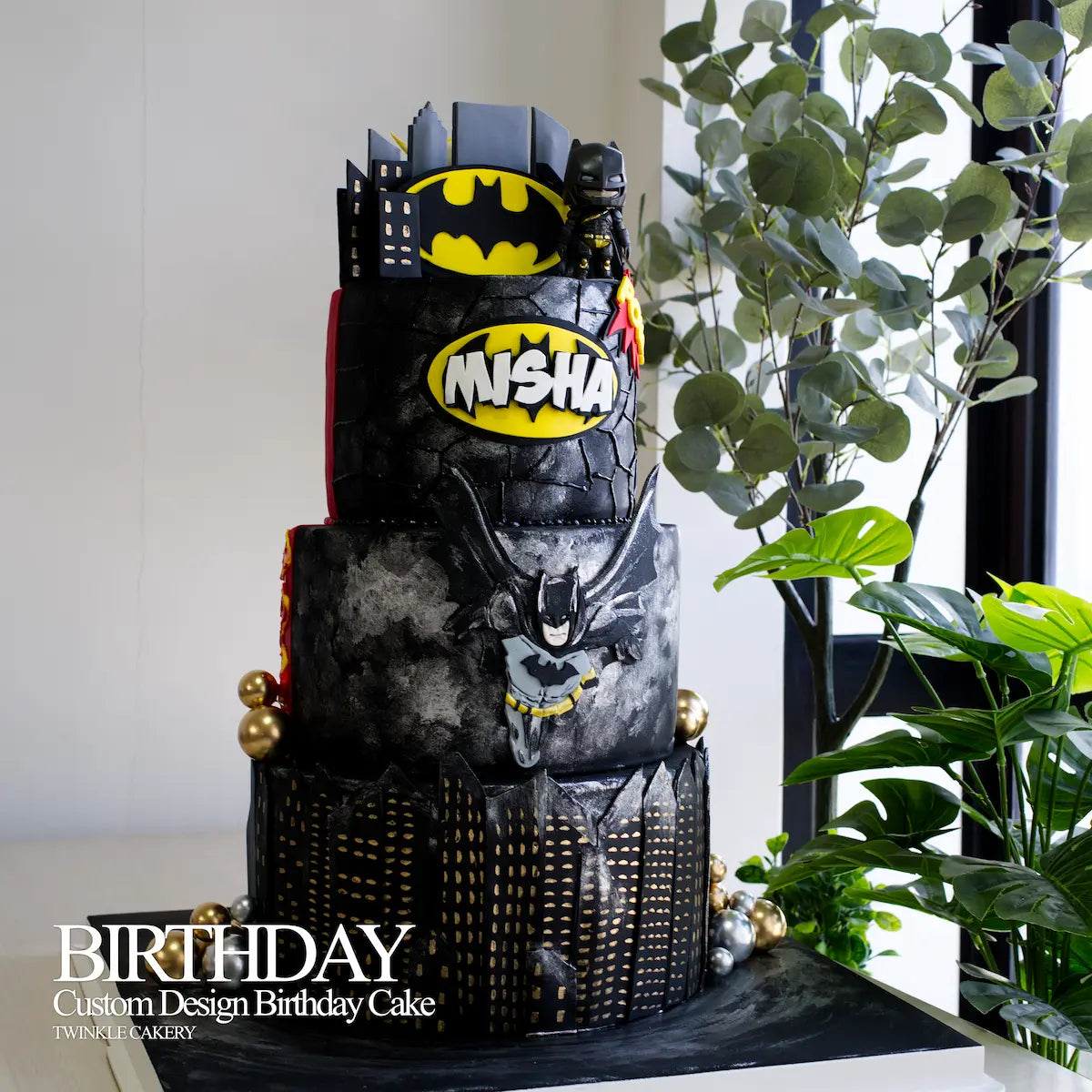Elegant Batman themed side of a 3-tier cake with black Gotham skyline, available in Petaling Jaya.