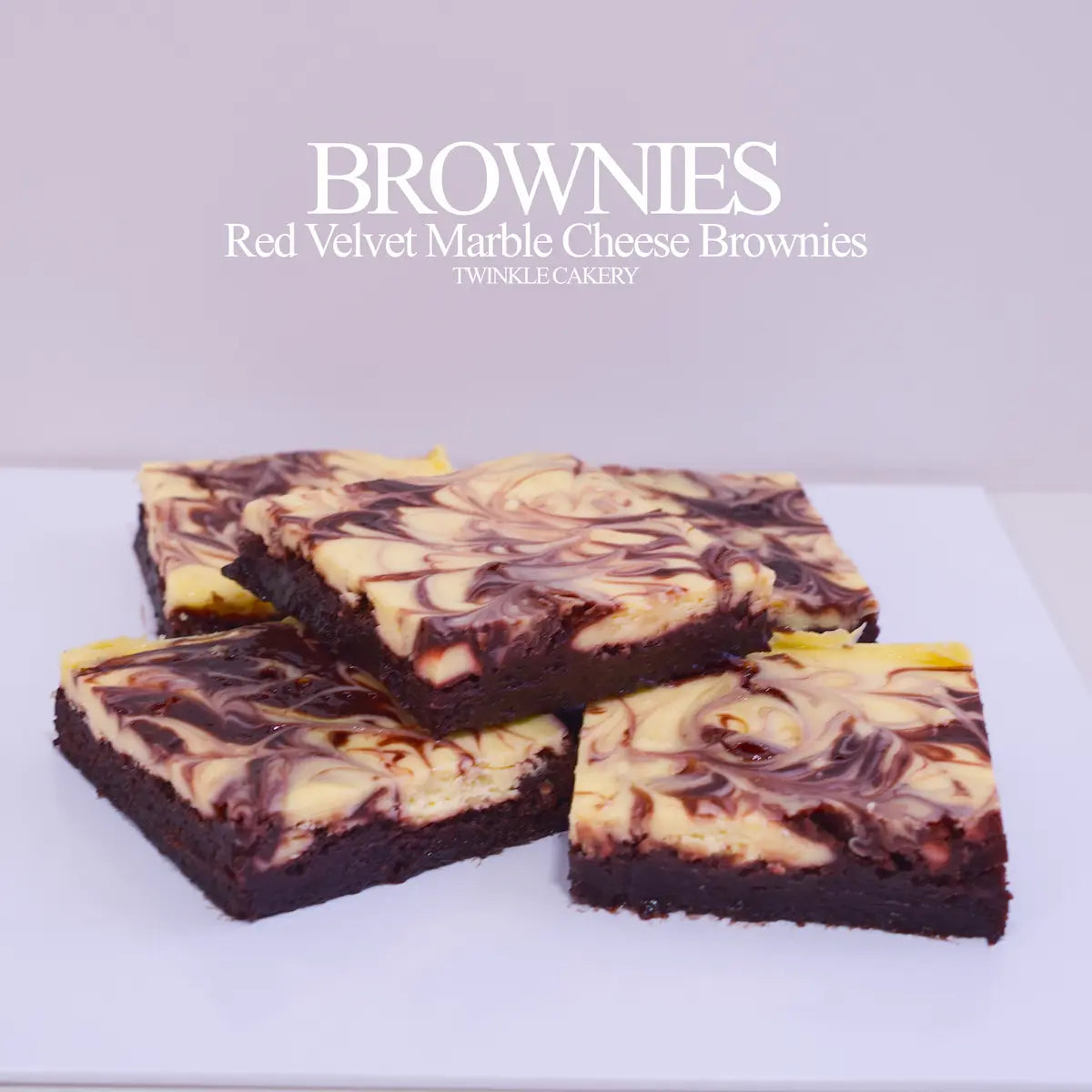 Cut piece of red velvet marble cheese brownie showing interior texture and pattern. Delivery across Selangor