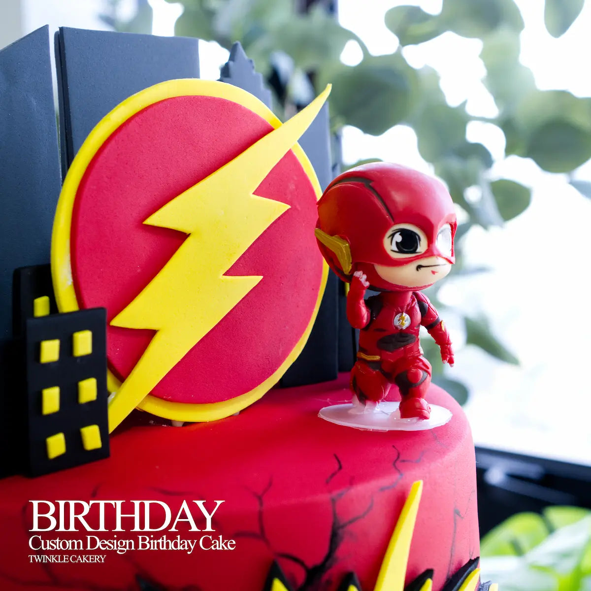 Custom hand-made fondant The Flash character mid-action on a luxury 3-tier superhero cake.
