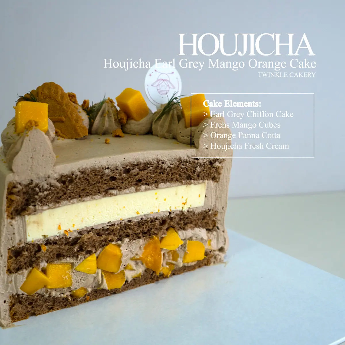 Slice showing Earl Grey chiffon, silky orange panna cotta layer, fresh mango cubes, and houjicha cream. 