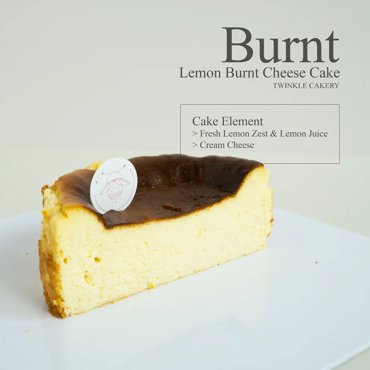 Cross section slice showing the velvety smooth baked cream cheese interior of a lemon burnt cheesecake.