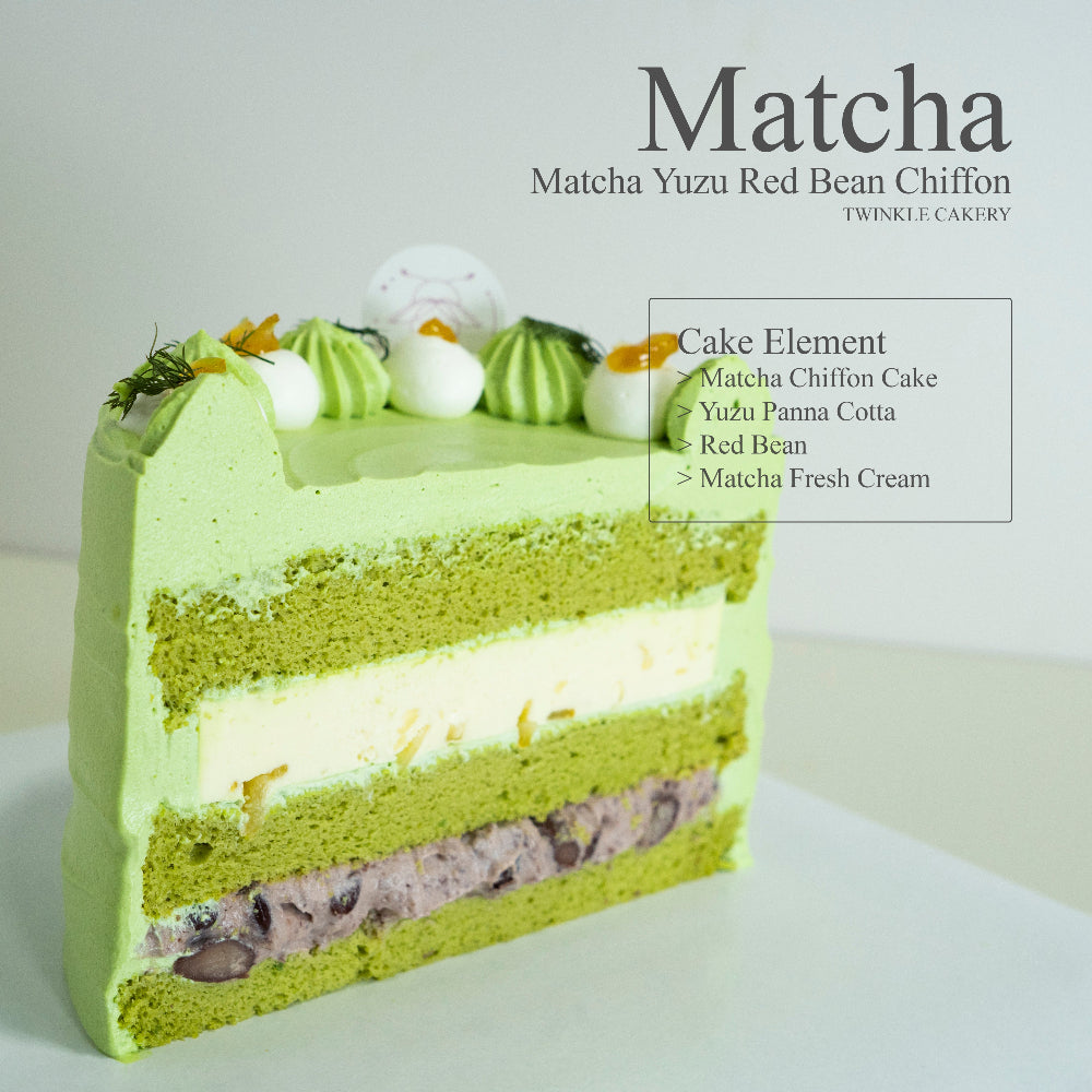 Cross section slice of matcha chiffon cake revealing yuzu panna cotta and sweet red bean layers.