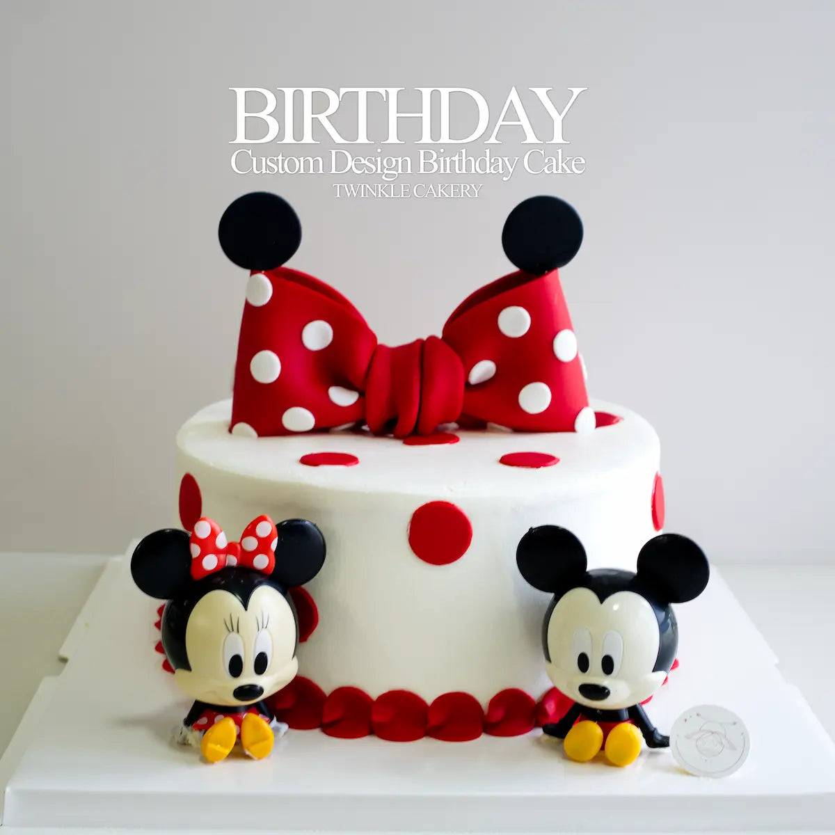 Mickey and Minnie Mouse birthday cake with big red fondant ribbon bow - custom Disney cake delivery in Kuala Lumpur & Selangor