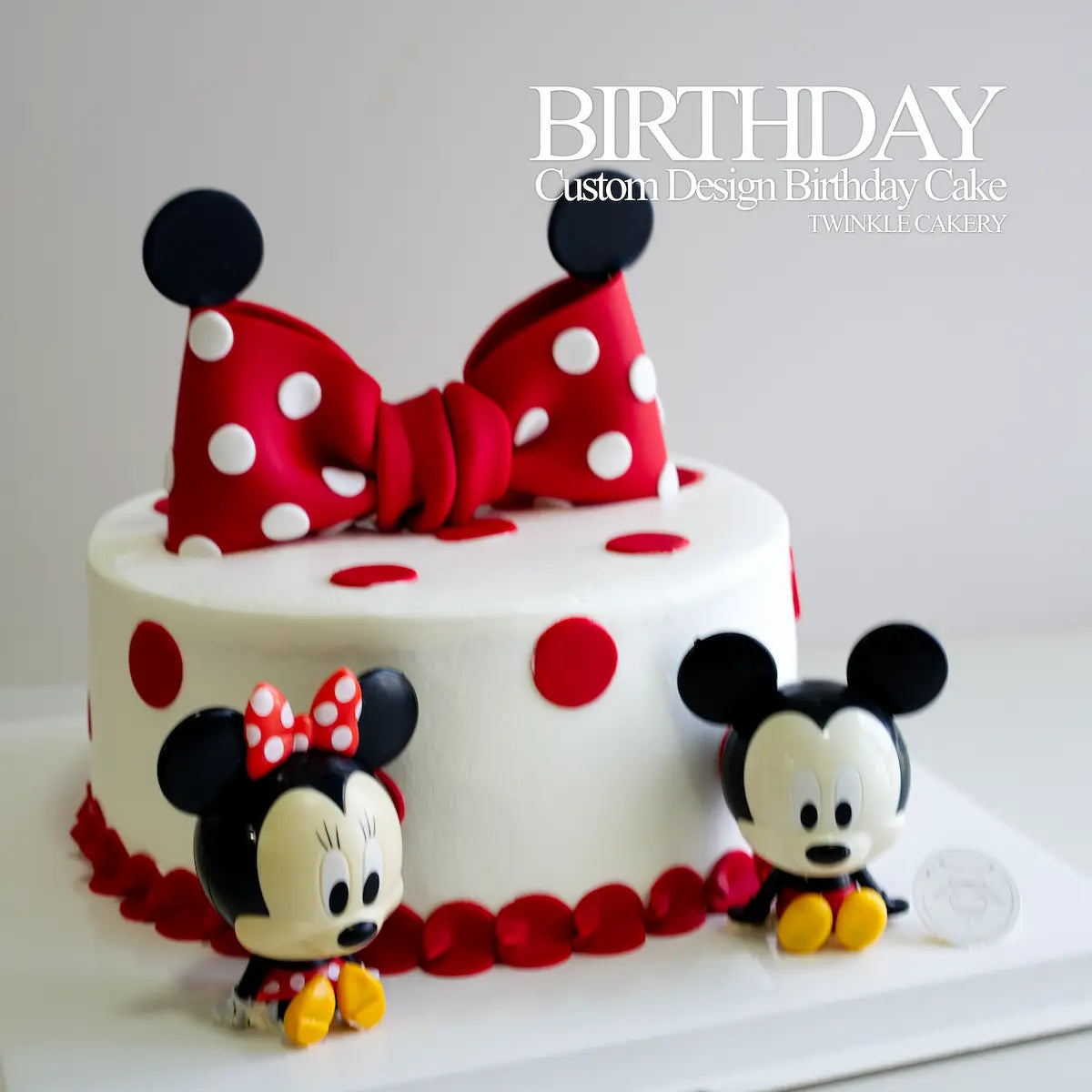 Cute Mickey Mouse and Minnie Mouse figurines beside the birthday cake - food-safe keepsakes for kids in Selangor
