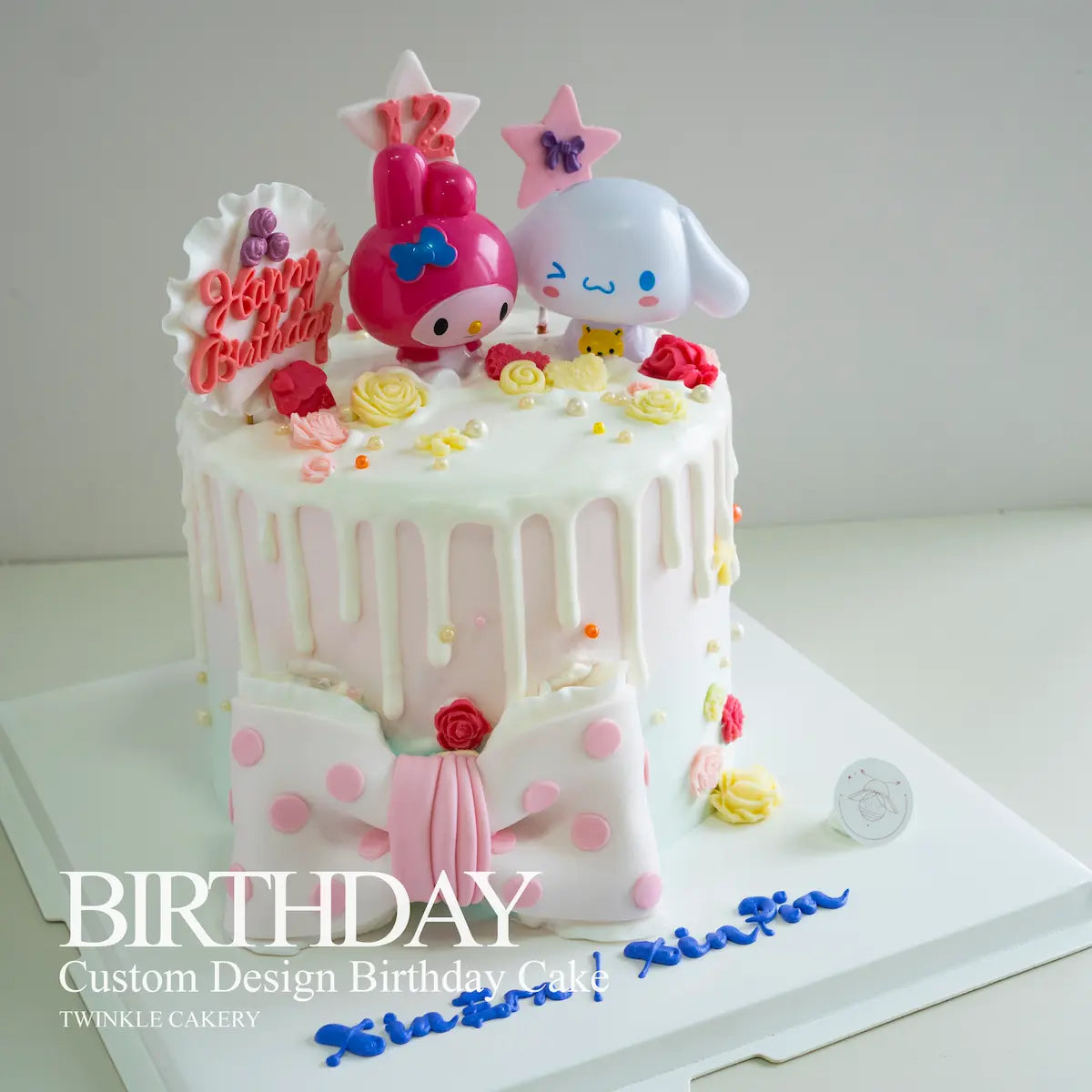 Handmade pink fondant ribbon and bow details on Sanrio character cake - delivery across Selangor