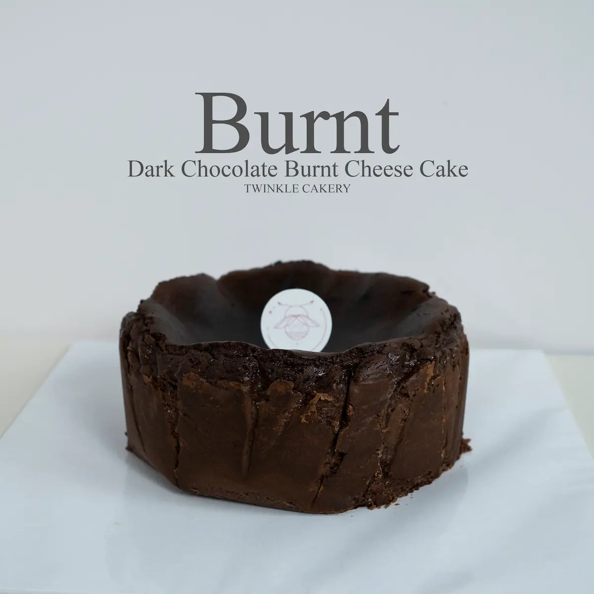 Gourmet dark chocolate Basque burnt cheesecake with a rich caramelized top by Twinkle Cakery Kuala Lumpur.