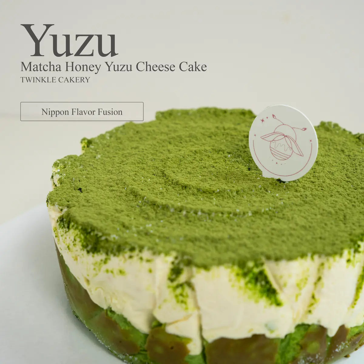 Top down view of premium matcha powder decoration dusted over a fondant free celebration mousse cake.