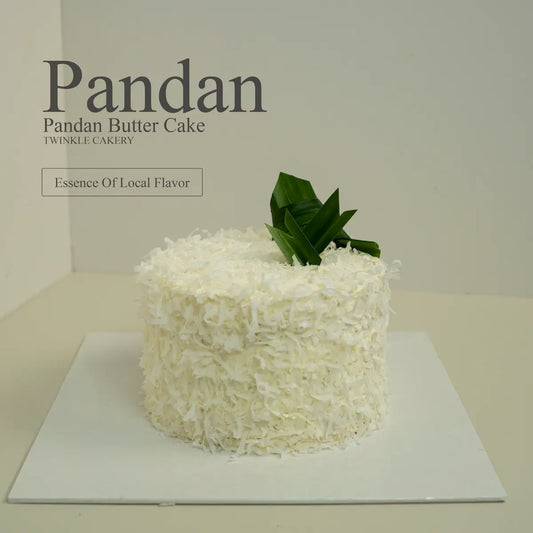 Whole loaf of premium Pandan Coconut Gula Melaka cake by Twinkle Cakery, drizzled with rich palm sugar syrup and topped with shredded coconut flakes, optimized for local delivery in Kuala Lumpur.