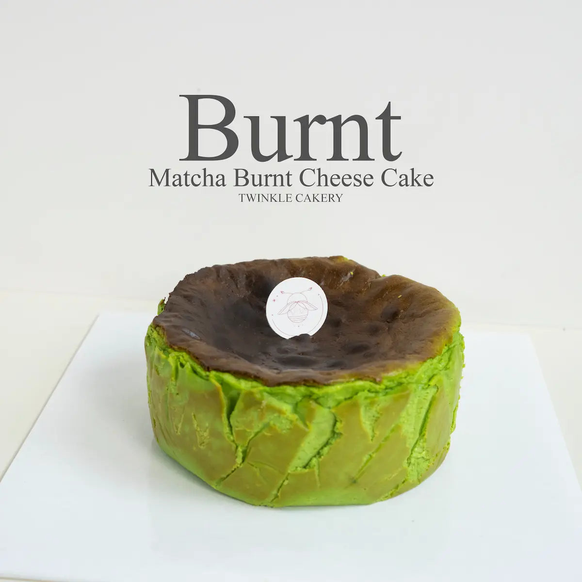 Artisan matcha Basque burnt cheesecake with a rich caramelized top by Twinkle Cakery Kuala Lumpur.